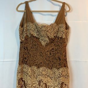 Carmen Marc Valvo browns and gold gown.